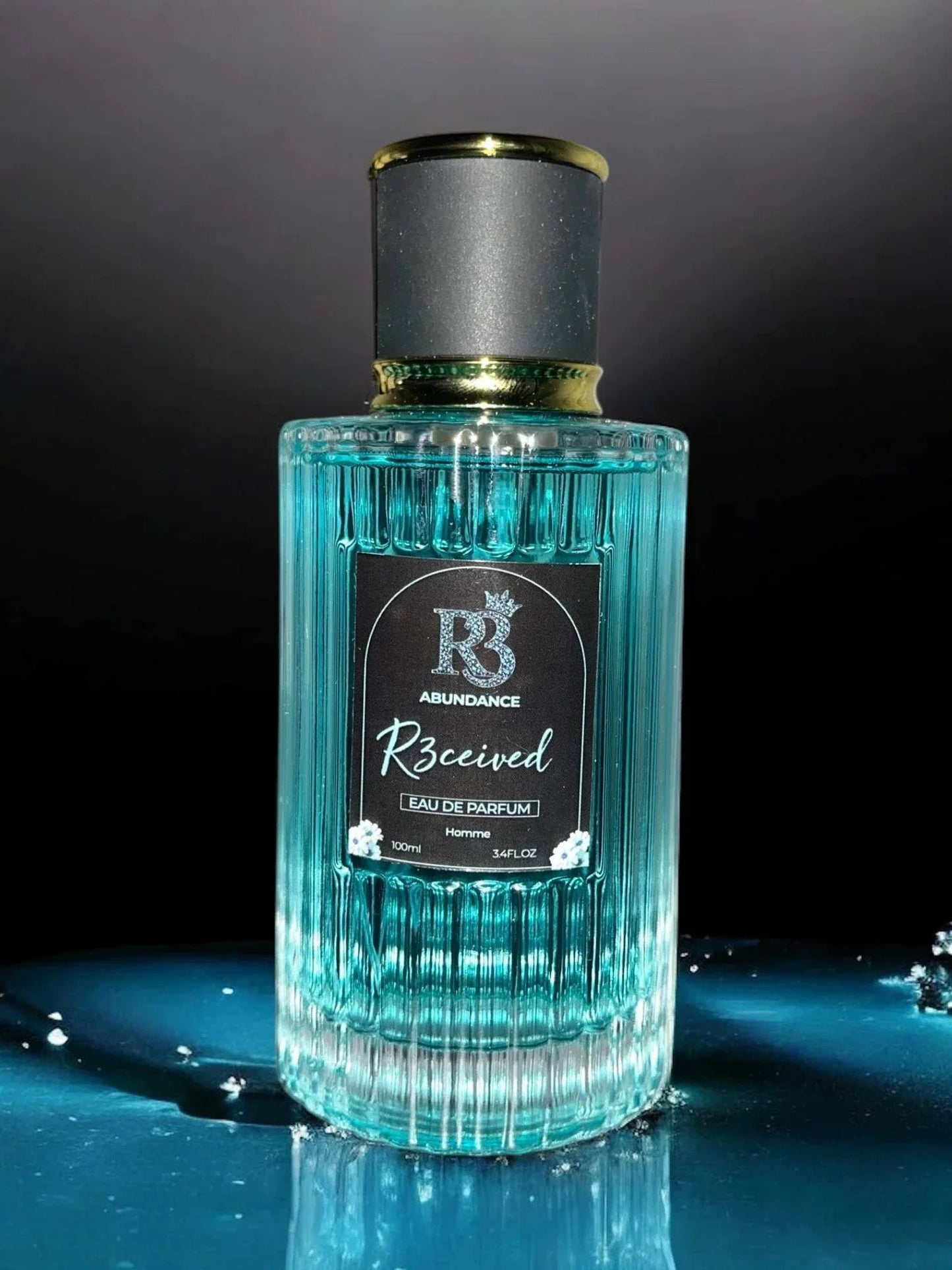 Abundance by R3CEIVED 100ml Eau de Parfum bottle with blue liquid and black cap for men