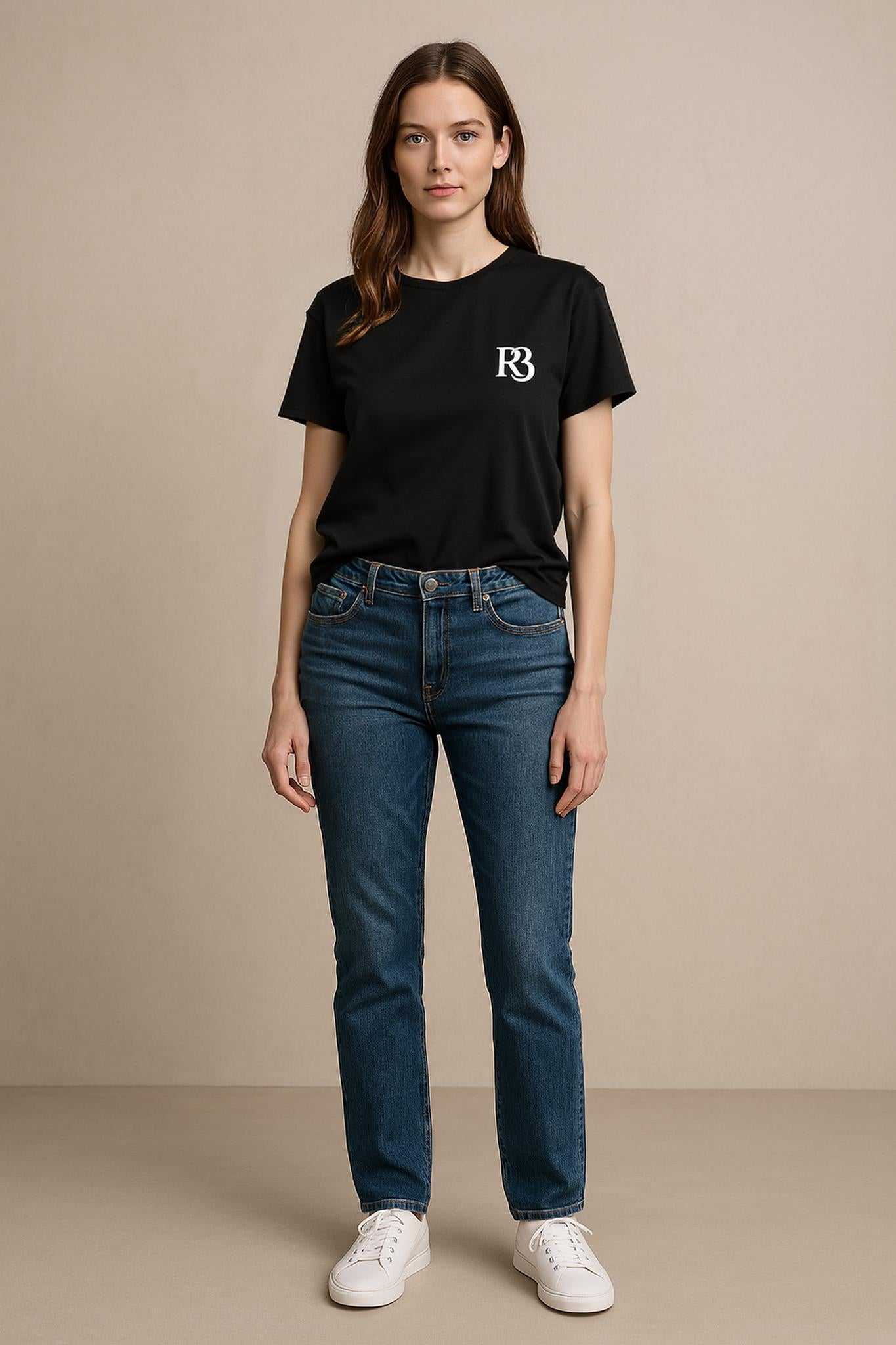 Female model wearing black R3 in God we trust oversized cotton shirt with jeans and white sneakers