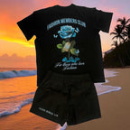 Men's R3 Fashion Members Club black swimming trunks with pockets and matching black t-shirt with blue rose design.