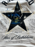 Star of Bethlehem tee with oversized fit, front star logo, and back illustration of Jesus and wise men with Bible verses